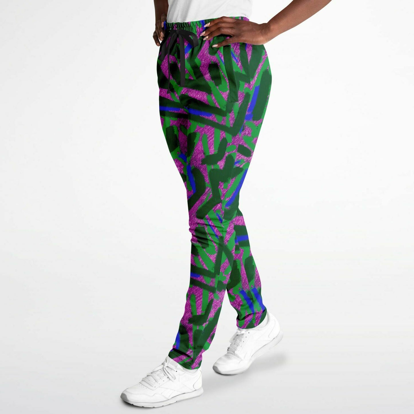 abstract graffiti print track Pants female side view 